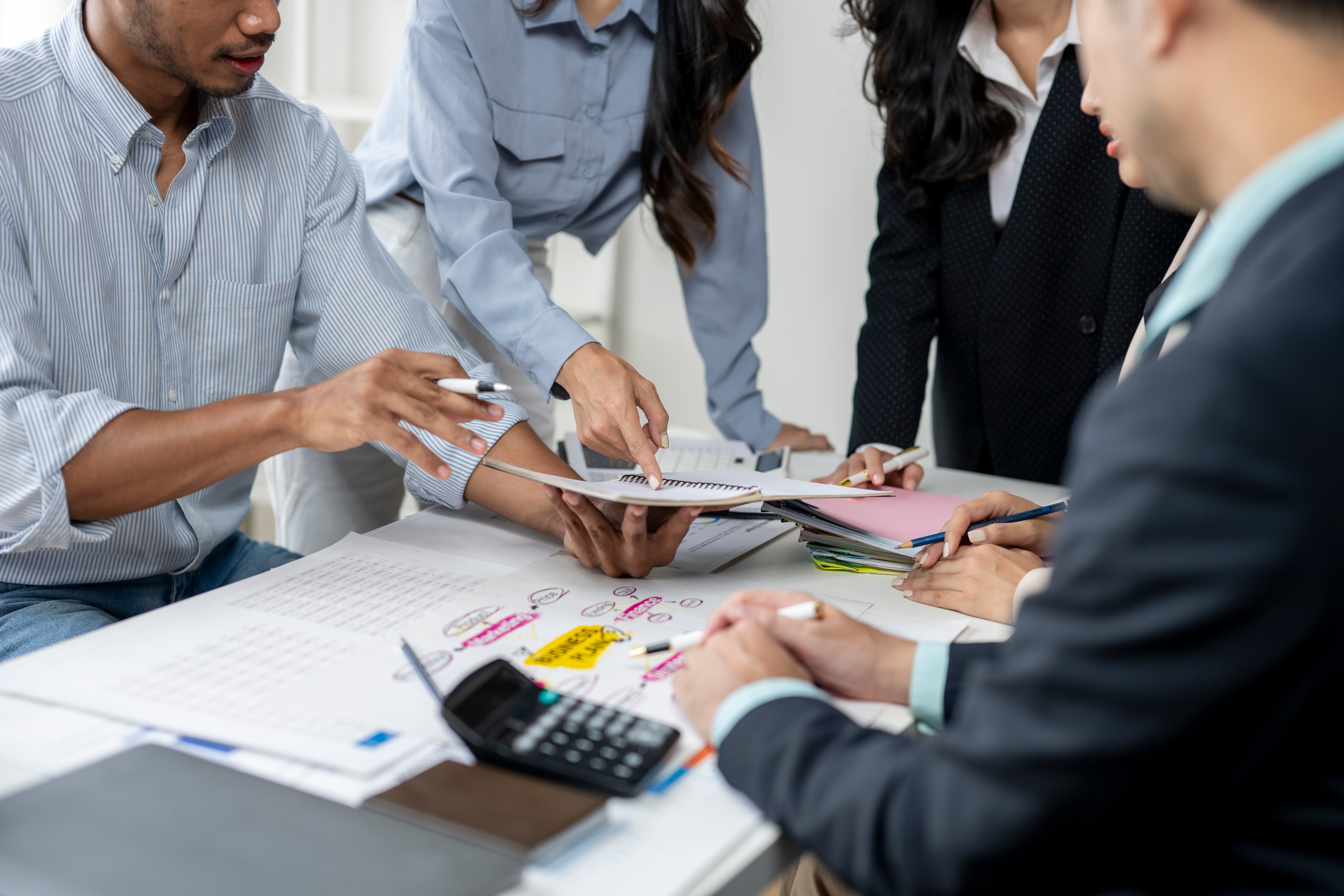 team strategizing sales and marketing solutions