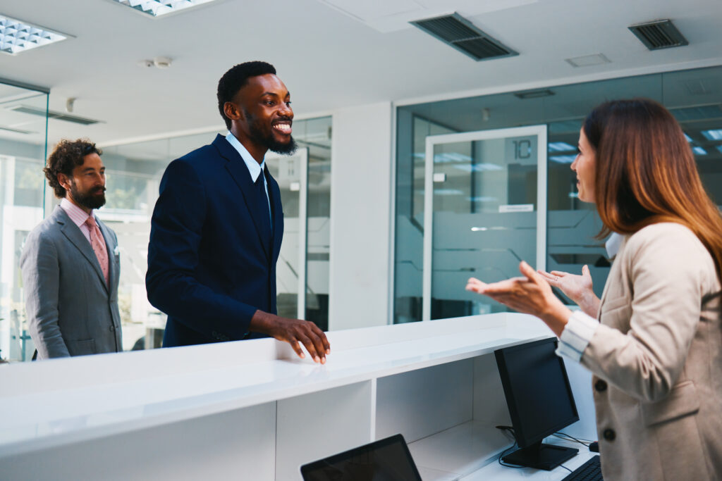 A sales rep having a face-to-face interaction with the customers.